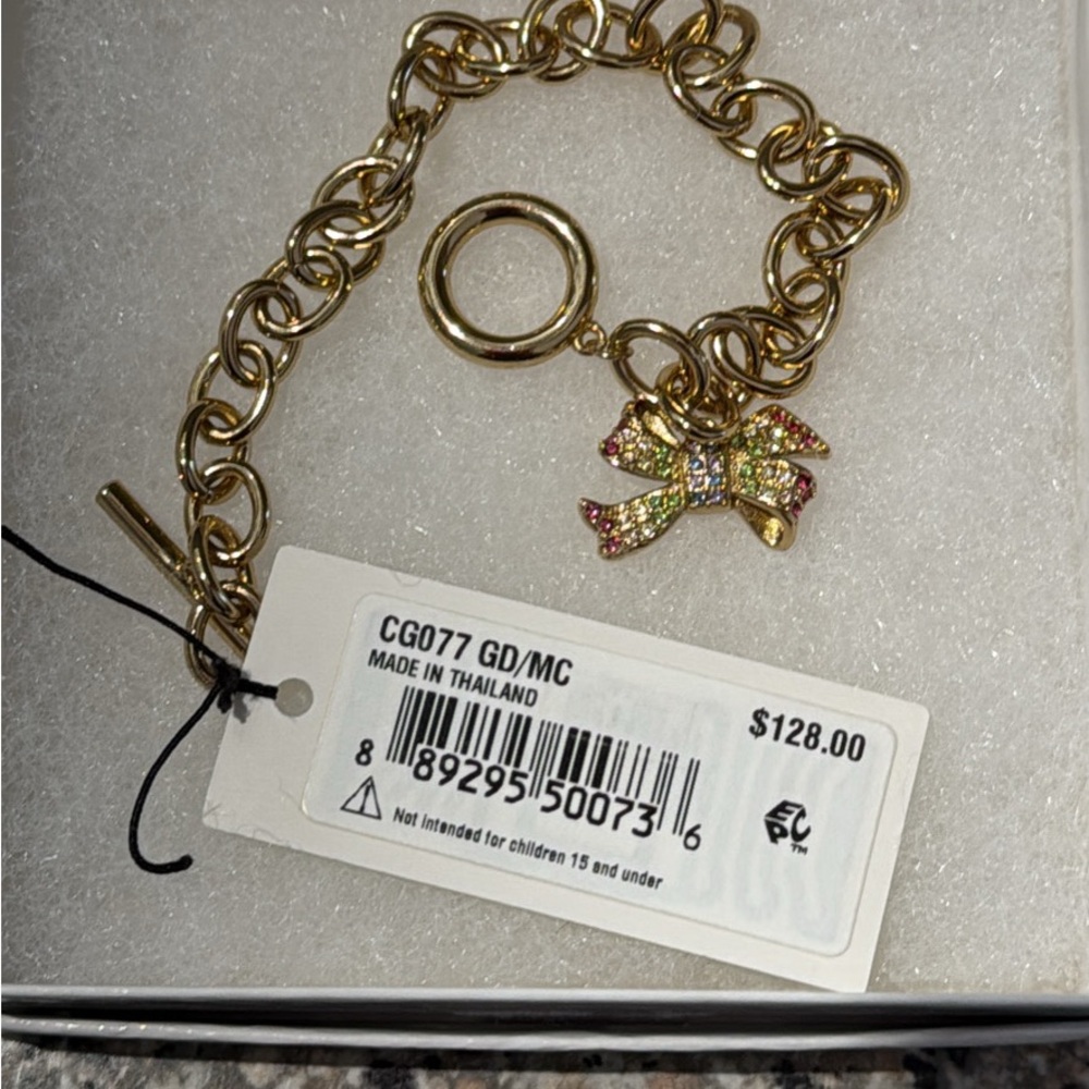 Coach Gold Bracelet with Multicolor Gem Encrusted Bow Charm New in Box - Picture 5 of 7